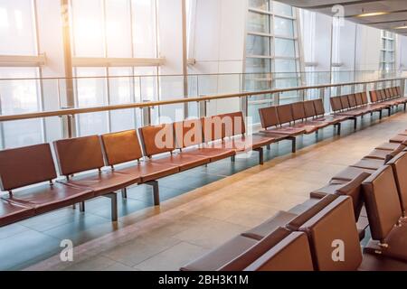 Empty seats in the lounge area for departing passengers Stock Photo