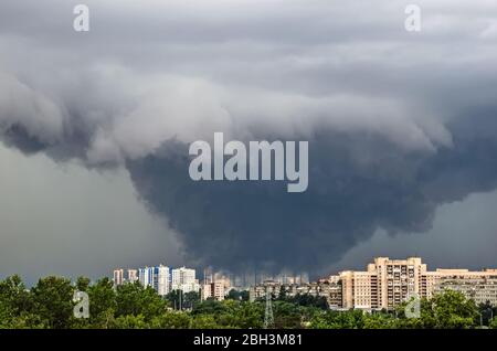 Huge wide powerful catastrophic tornado in a densely populated city power on a scale of F3, EF4-5 Stock Photo