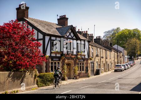 UK, England, Cheshire, Bollington, Palmerston Street, Hollybush Inn and stone built terraced houses Stock Photo