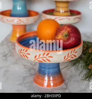 colorful handmade ceramic bowls and pots Stock Photo