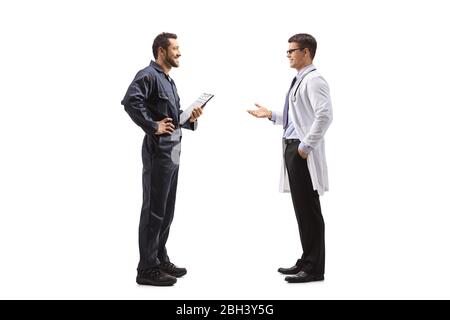 Full length profile shot of a doctor and an auto mechanic having a conversation isolated on white background Stock Photo