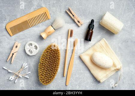 Flat lay composition with bath cosmetics and accessories on stone table. SPA treatment at home, body care concept Stock Photo