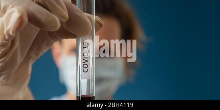 Glass tube with blood sample and label Hormone Test on table Stock ...