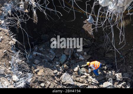 Wien, Vienna: construction site worker at demolished building, in , Wien, Austria Stock Photo