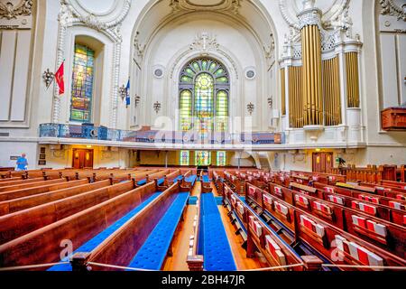 Annapolis, Maryland, USA. 9th Aug, 2019. The United States Naval Academy Chapel photographed Friday, August 9, 2019 in Annapolis, Maryland. The Chapel is one of two houses of worship on the grounds of the Navy's service academy. Protestant and Catholic services are held there. The Naval Academy Chapel is a focal point of the Academy and the city of Annapolis. The chapel is an important feature which led to the Academy being designated a National Historic Landmark in 1961. It was designed by Ernest Flagg and the cornerstone was laid in 1904 by Admiral George Dewey and the dedication of the Cha Stock Photo