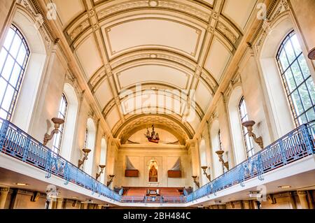 Annapolis, Maryland, USA. 9th Aug, 2019. The United States Naval Academy Chapel photographed Friday, August 9, 2019 in Annapolis, Maryland. The Chapel is one of two houses of worship on the grounds of the Navy's service academy. Protestant and Catholic services are held there. The Naval Academy Chapel is a focal point of the Academy and the city of Annapolis. The chapel is an important feature which led to the Academy being designated a National Historic Landmark in 1961. It was designed by Ernest Flagg and the cornerstone was laid in 1904 by Admiral George Dewey and the dedication of the Cha Stock Photo