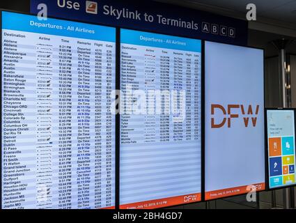 Arrival and departure, departures board at DFW, Dallas - Fort Worth International Airport, Texas, USA. Stock Photo