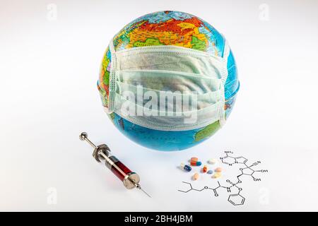 Remdesivir antiviral, thought to could cure coronavirus respiratory sickness. Remdesivir molecule and some medicines/injection syringe near the earth Stock Photo