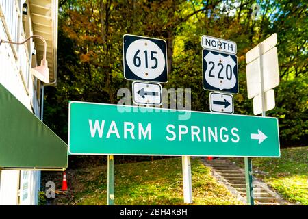 Hot Springs, USA downtown town village city in Virginia countryside with street road highway 615 and 220 directional sign for Warm Springs and arrow Stock Photo
