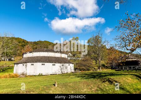 Historic Warm Springs town and old run-down closed Jefferson Pools octagon architecture building in Virginia Bath County countryside in mountains Stock Photo