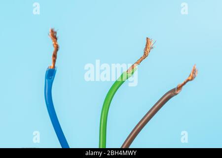 Electric wire isolate on blue background Stock Photo