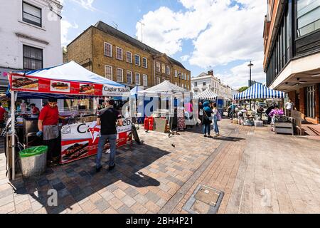 London, UK - June 21, 2018: Neighborhood of Pimlico in Victoria with Tachbrook street food market in downtown with stall stand vendors for fast food Stock Photo