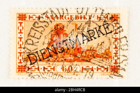 SEATTLE WASHINGTON - April 22, 2020:  1930 Official stamp of Saarland, featuring mining collier shafthead with DIENSTMARKE overprint. Stock Photo