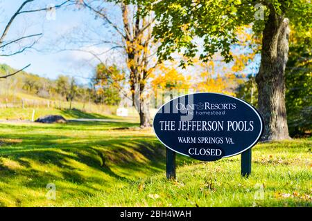 Warm Springs, USA - October 18, 2019: Historic town and closed Jefferson Pools building sign in Virginia Bath County countryside in mountains Stock Photo