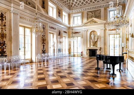 Warsaw, Poland - December 20, 2019: Grand interior of Palace on the Isle in Warszawa Lazienki or Royal Baths Park with chandelier lamp, wooden floor a Stock Photo