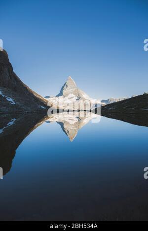 Matterhorn mountain and lake in Valais, Switzerland Stock Photo