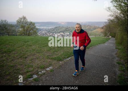 Stuttgart, Germany. 09th Apr, 2020. Alfred Meyer, who will be 95 years old in May, runs a 15 km long route through a forest near Stuttgart. (to dpa: 'The course of life: 94-year-old jogged away from the corona crisis ') Credit: Marijan Murat/dpa/Alamy Live News Stock Photo
