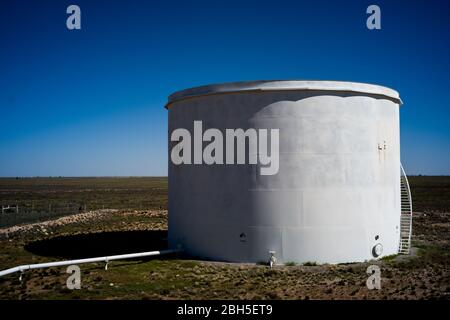 Eddy County, New Mexico, USA. 23rd Apr, 2020. A crude oil storage container within the Permian Basin oil fields in Eddy County, New Mexico. Credit: Joel Angel Juarez/ZUMA Wire/Alamy Live News Stock Photo