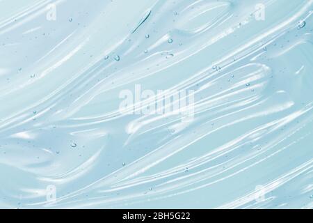 Clear blue gel texture. Hand sanitizer, alcohol gel, moisturizer swatch. Clear transparent  skincare product sample closeup Stock Photo