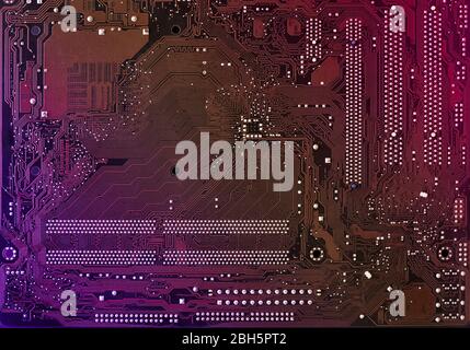 Computer motherboard background with blur neon multicolor glow, pc backdrop, close up Stock Photo