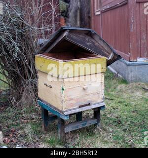 Abandoned hive with removed top, outdoor daytime shot Stock Photo