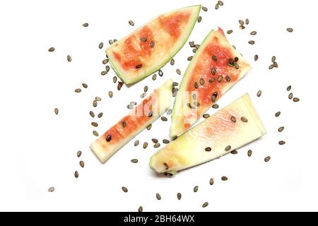 eaten slice of watermelon with watermelon seeds isolated on white backgrounds Stock Photo