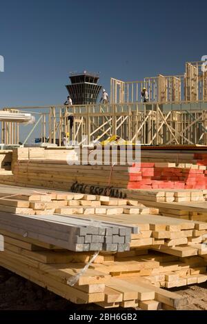 Austin, TX April 2, 2009: Construction continues on the Mueller housing development on the site of the old Austin Mueller Airport that will eventually consist of more than 1,100 homes on 700 acres. The site is an example of a sustainable, transit-oriented, new urbanist development in the heart of central Austin.  ©Bob Daemmrich Stock Photo