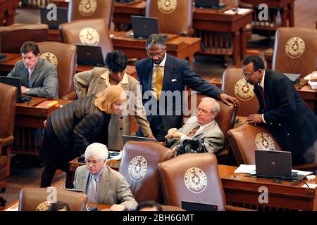Austin, Texas USA, June 1, 2009: The final day of Texas' 81st Legislative Session in the House chamber showing members discussing pending bills on the House floor.  ©Bob Daemmrich Stock Photo