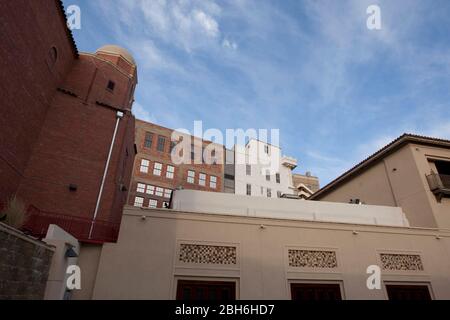 El Paso, Texas May 14, 2009: Scenes from the arts district downtown El Paso, TX showing a portion of the Plaza Theater's 1930-era complex (foreground) with older buildings behind.  ©Bob Daemmrich Stock Photo