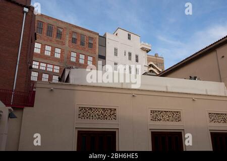 El Paso, Texas May 14, 2009: Scenes from the arts district downtown El Paso, TX showing a portion of the Plaza Theater's 1930-era complex (foreground) with older buildings behind.  ©Bob Daemmrich Stock Photo