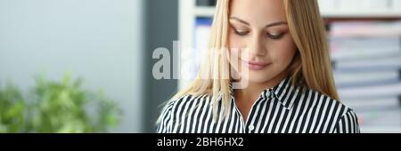 Cute female taking notes Stock Photo