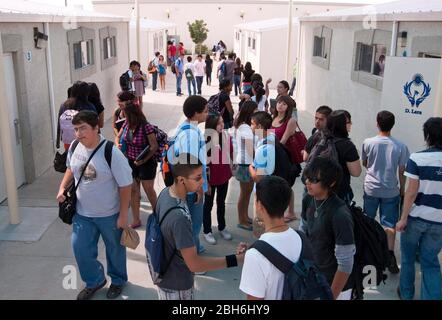 El Paso, Texas  May 28, 2009: Exterior views between classes outside the portable buildings at Mission Early College High School in the Socorro school district of El Paso. Motivated students can earn an associate degree at El Paso Community College while studying for their high school diploma in the program.  ©Bob Daemmrich Stock Photo