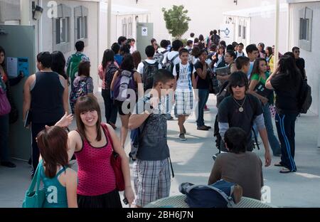 El Paso, Texas  May 28, 2009: Exterior views between classes outside the portable buildings at Mission Early College High School in the Socorro school district of El Paso. Motivated students can earn an associate degree at El Paso Community College while studying for their high school diploma in the program.  ©Bob Daemmrich Stock Photo