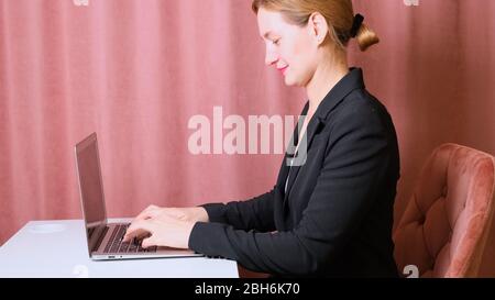 woman working laptop. Business woman busy working on laptop computer at office Stock Photo