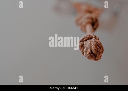 Thick ropes hanging from above in vertical shape. Decorative purpose is  placed in front of the cafe. T Stock Photo - Alamy