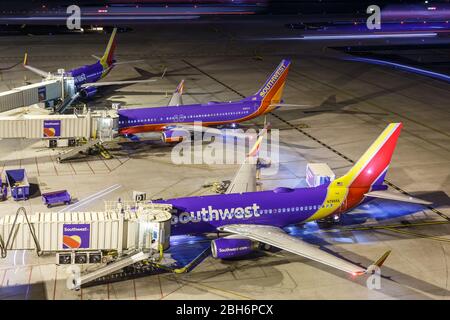 Phoenix, Arizona – April 8, 2019: Southwest Airlines Boeing 737 airplanes at Phoenix Sky Harbor airport (PHX) in Arizona. Boeing is an American aircra Stock Photo