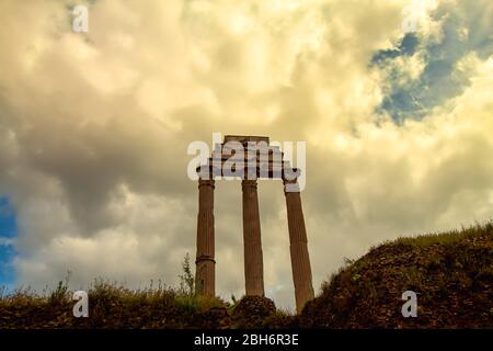 Rome, Italy - April 28, 2019 - View of the famous columns of roman ruins on a cloudy day in Rome Stock Photo