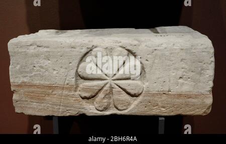 Fragment of door post with rosette carved. 1st half of the 8th century. Sandstone. From Faras Cathedral (Sudan). Faras Gallery. National Museum. Warsaw. Poland. Stock Photo