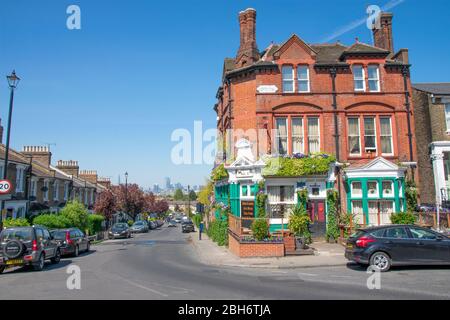 London / UK - 21 April 2020: Empty streets and an empty pub with views of London's skyline in Nunhead during the virus lockdown Stock Photo