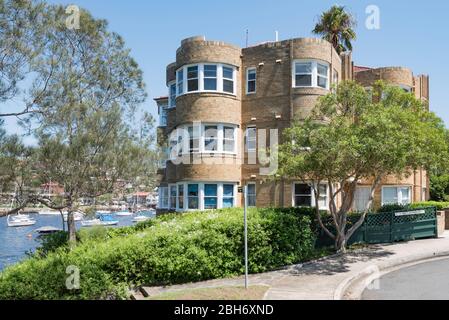 A c1930's art deco and ocean liner style low rise, apartment block with uninterrupted, prime views over Sydney Harbour in North Sydney, Australia