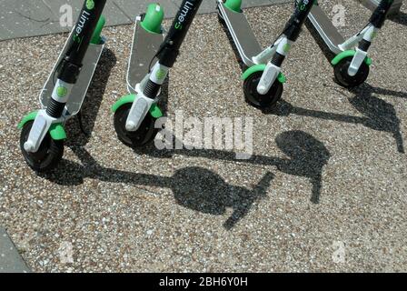 Lime-S electric scooters parked in Brisbane city centre, Queensland, Australia. Stock Photo