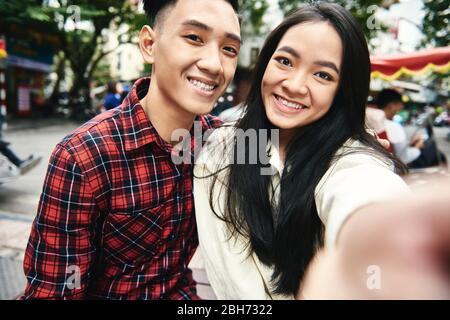 Young couple taking selfie while traveling Stock Photo