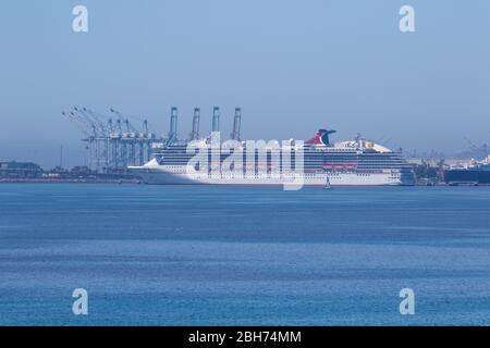 The Carnival Miracle cruise ship remains at the Carnival cruise port in Long Beach California during the Coronavirus pandemic of 2020 Stock Photo