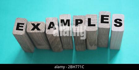 Examples word written on wooden blocks. Education or storytelling marketing concept Stock Photo
