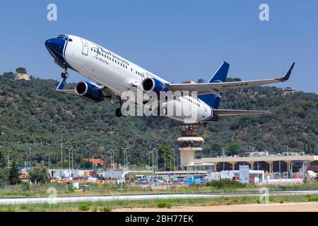 Skiathos, Greece – August 2, 2019: Blue Panorama Boeing 737-800 airplane at Skiathos airport (JSI) in Greece. Stock Photo