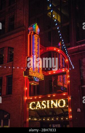 Neon sign hanging outside the entrance to the Greektown Casino in downtown Detroit, Michigan Stock Photo