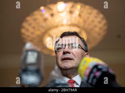 Munich, Germany. 24th Apr, 2020. Florian Herrmann (CSU), Head of the State Chancellery and Minister of State for Federal and European Affairs and Media, comments after the session of the Bavarian State Parliament on the reopening of church services in Bavaria from 4 May 2020. Credit: Peter Kneffel/dpa/Alamy Live News Stock Photo