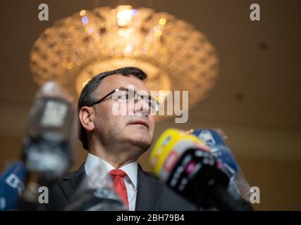 Munich, Germany. 24th Apr, 2020. Florian Herrmann (CSU), Head of the State Chancellery and Minister of State for Federal and European Affairs and Media, comments after the session of the Bavarian State Parliament on the reopening of church services in Bavaria from 4 May 2020. Credit: Peter Kneffel/dpa/Alamy Live News Stock Photo