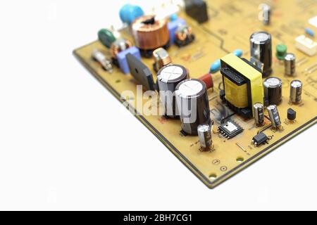 Closed up shot of Broken, damaged integrated circuit on printed circuit board. Stock Photo