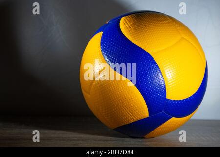 Blue and yellow ball on the grey background Stock Photo